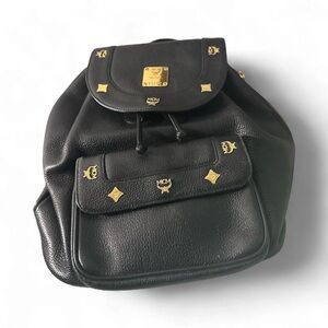 MCM Black pebbled leather lBackpack with Gold Details no call outs nice 😊